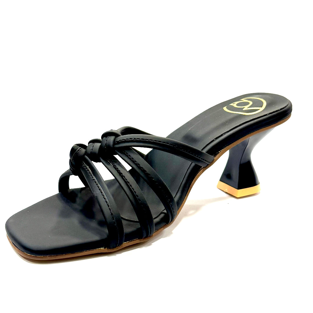 Black sandal with a high heel on a white background