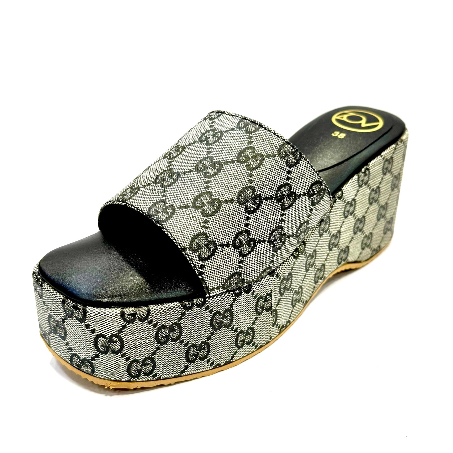 Patterned slide sandal on a white background