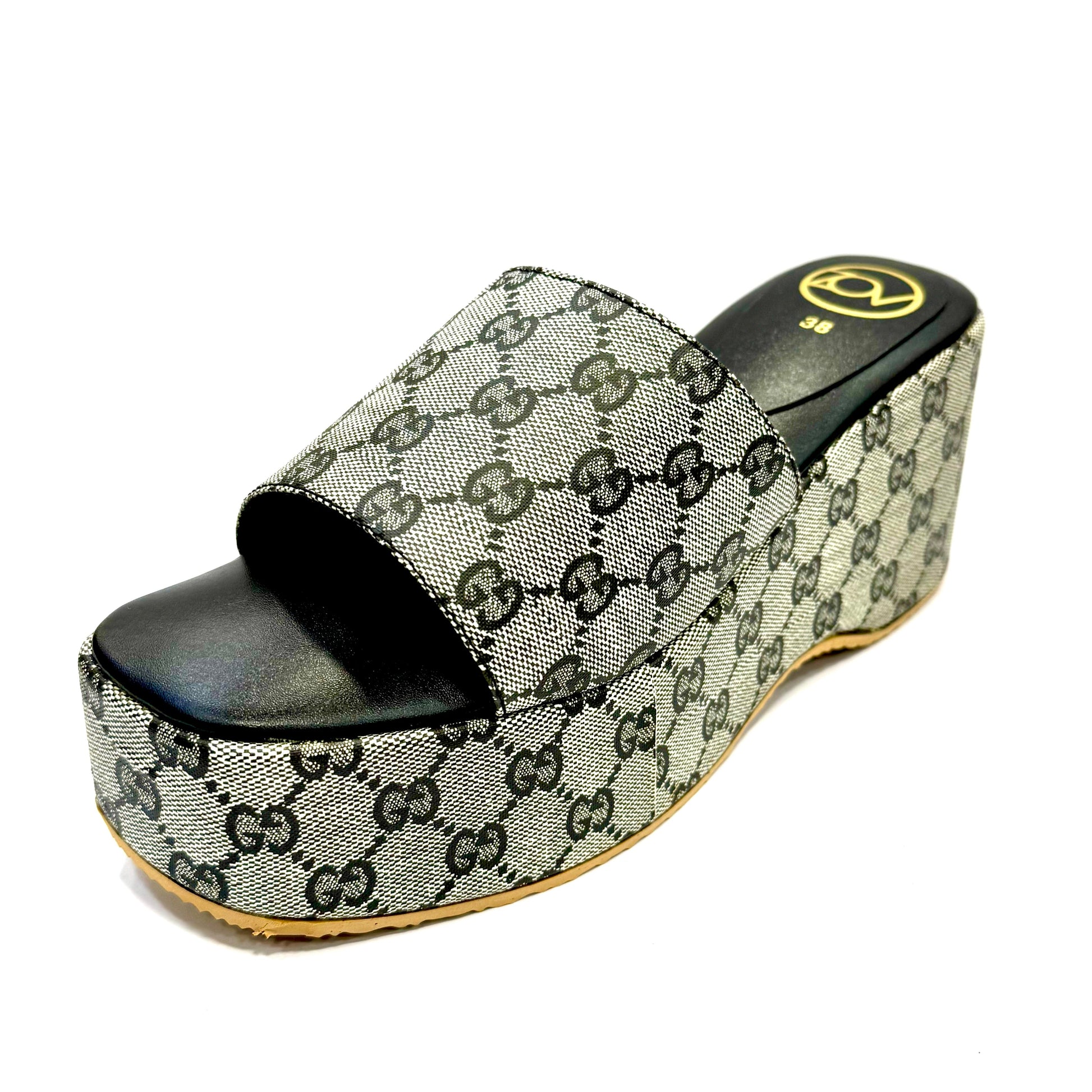 Patterned slide sandal on a white background